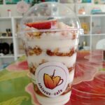 Hibiscus Cafe Oistins Barbados healthy delicious yogurt granola parfait in a takeaway cup